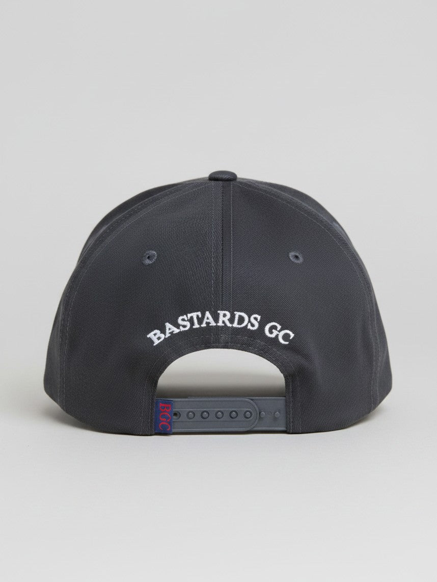 Rear view of The Yank navy golf cap with white Bastards GC embroidery and BGC rear tab