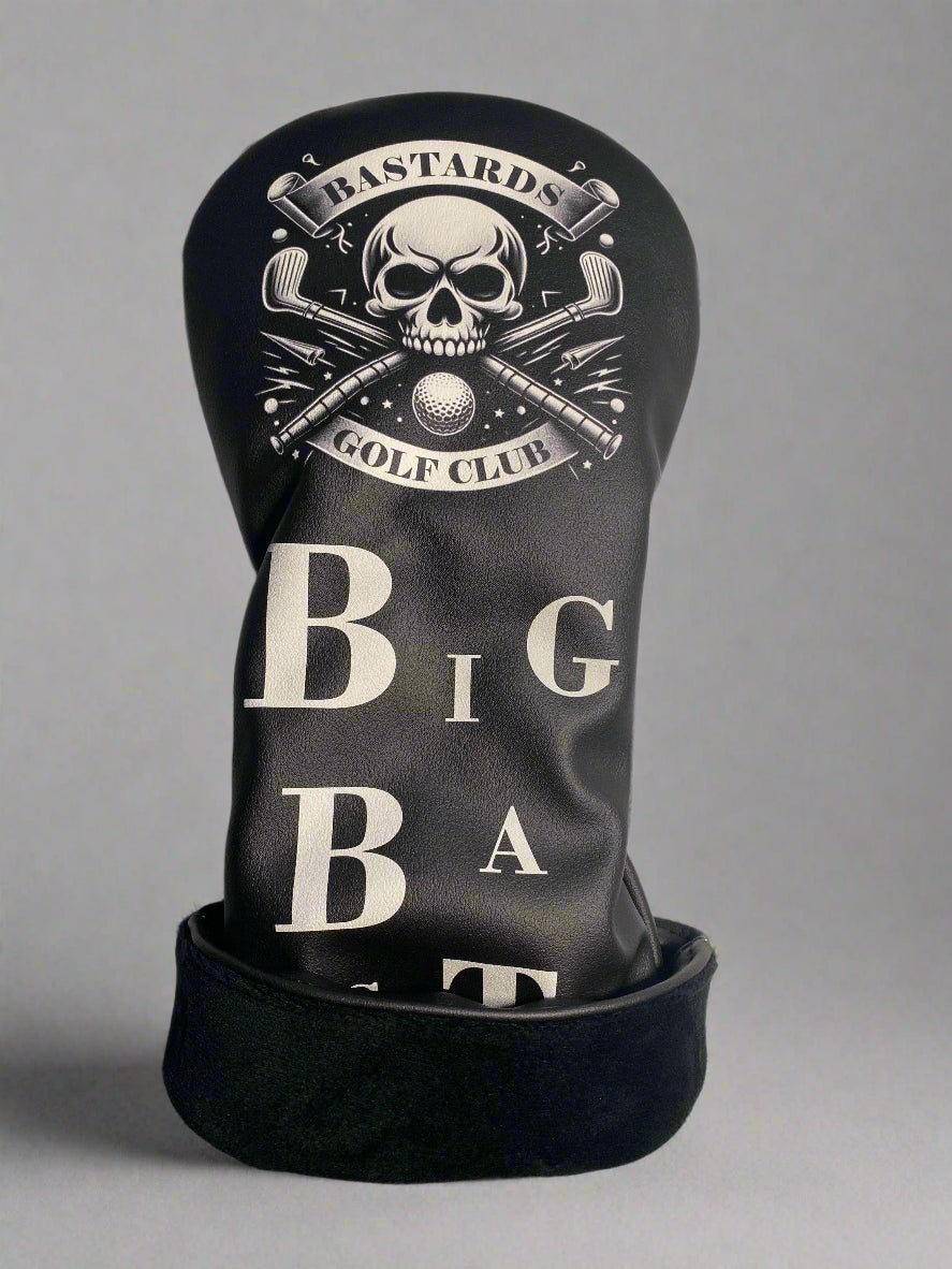 Black golf club head cover with skull design and text on a gray background