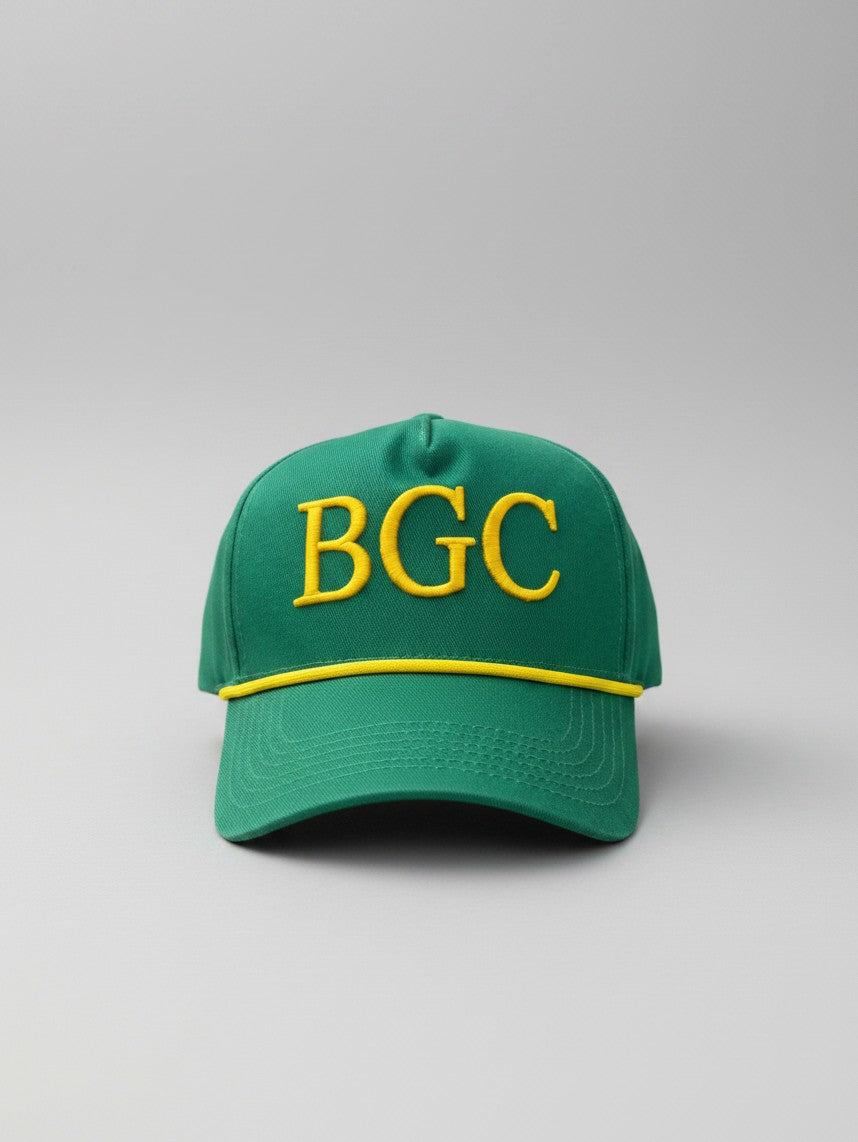 Front view of Sunday Green golf rope cap with raised gold BGC embroidery