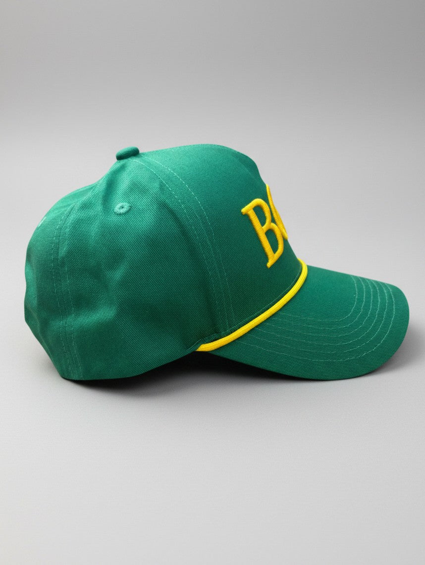 Right side profile of Sunday Green structured green and gold golf rope cap