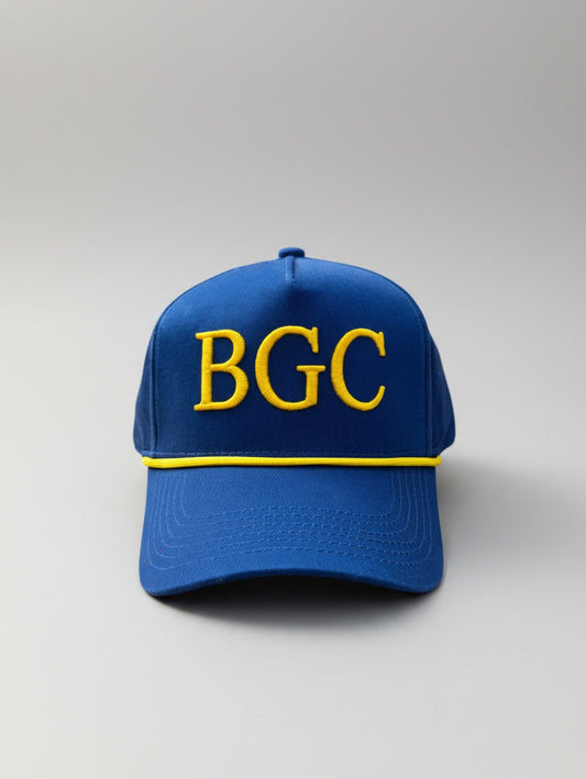 Front view of The Captain blue golf rope cap with raised gold BGC embroidery