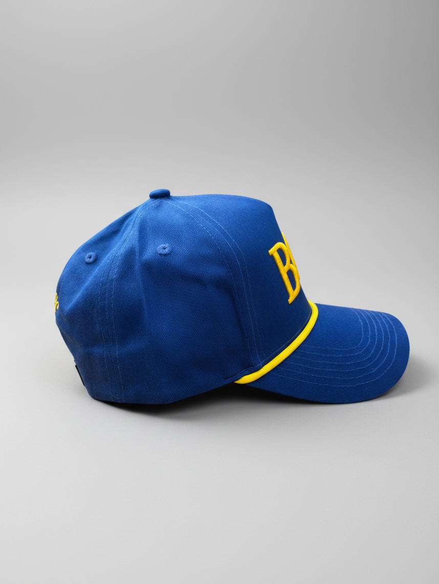 Right side profile of The Captain blue and gold structured golf rope cap
