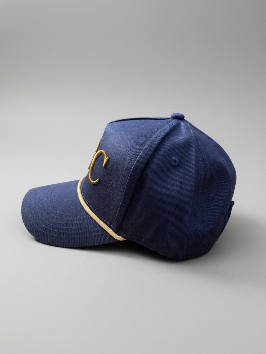 Left side profile of The Major navy and gold structured golf rope cap